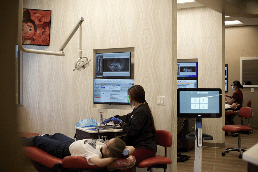 A girl being examined by an orthodontist in San Marcos, CA.